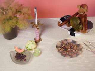spiral biscuits and wooden monkey on table