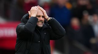 Manchester City manager Pep Guardiola reacts with frustration during his side's derby defeat to Manchester United at Old Trafford in January 2023.