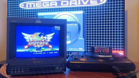 Sega Mega Drive connected to Sony PVM with Sonic the Hedgehog 2 title screen on display.