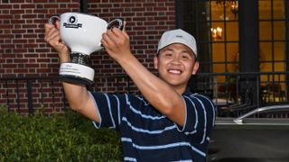 Luke Kwon holds the Creator Classic trophy