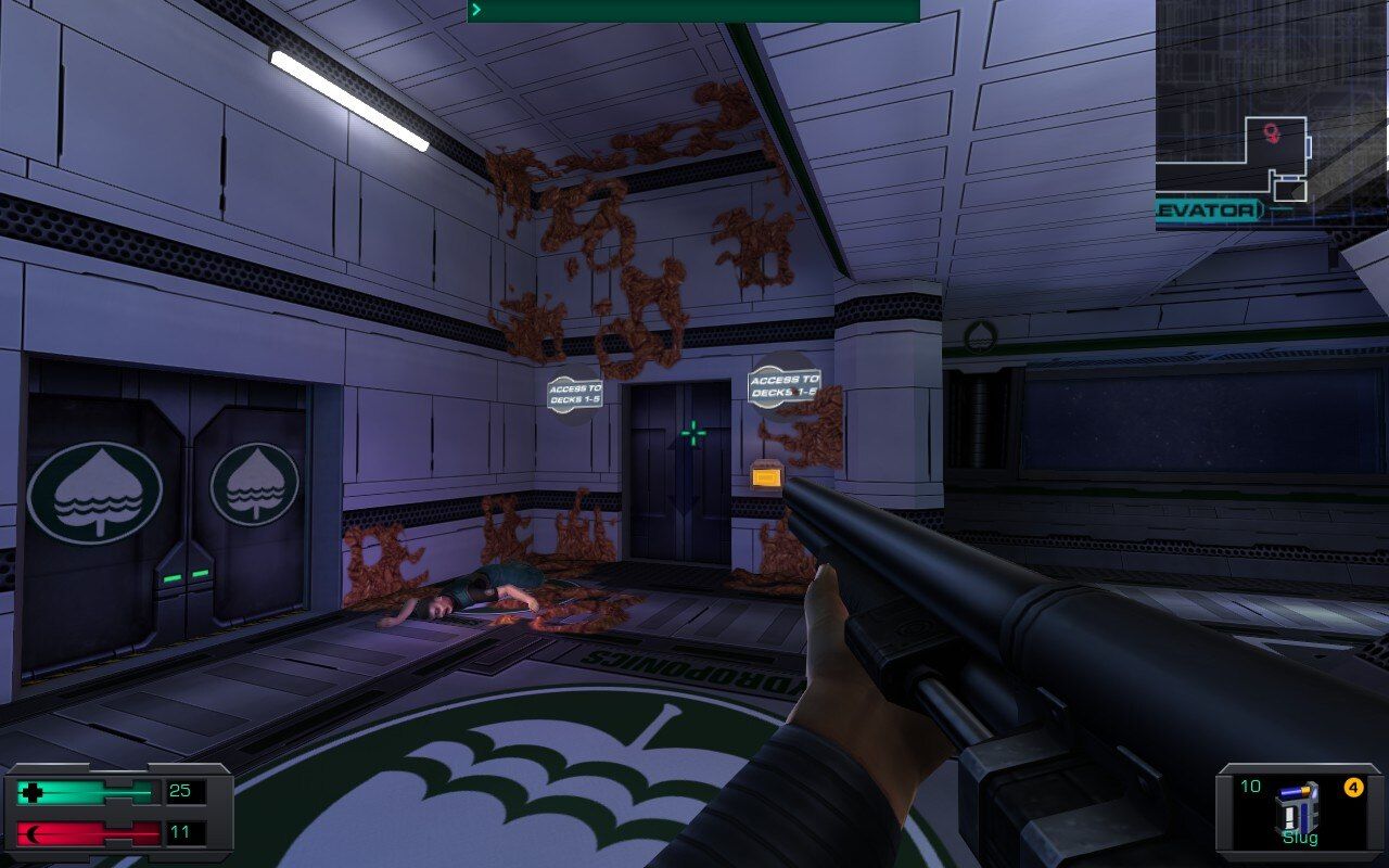 Elevator in sterile hallway covered in orange goop in System Shock 2