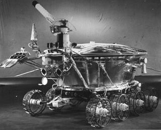 On Nov. 17, 1970 the Soviet Luna 17 spacecraft landed the first roving remote-controlled robot on the Moon. Known as Lunokhod 1, it weighed just under 2,000 pounds and was designed to operate for 90 days while guided by a 5-person team on planet Earth at the Deep Space Center near Moscow, USSR. Lunokhod 1 actually toured the lunar Mare Imbrium (Sea of Rains) for nearly 11 months in one of the greatest successes of the Soviet lunar exploration program.