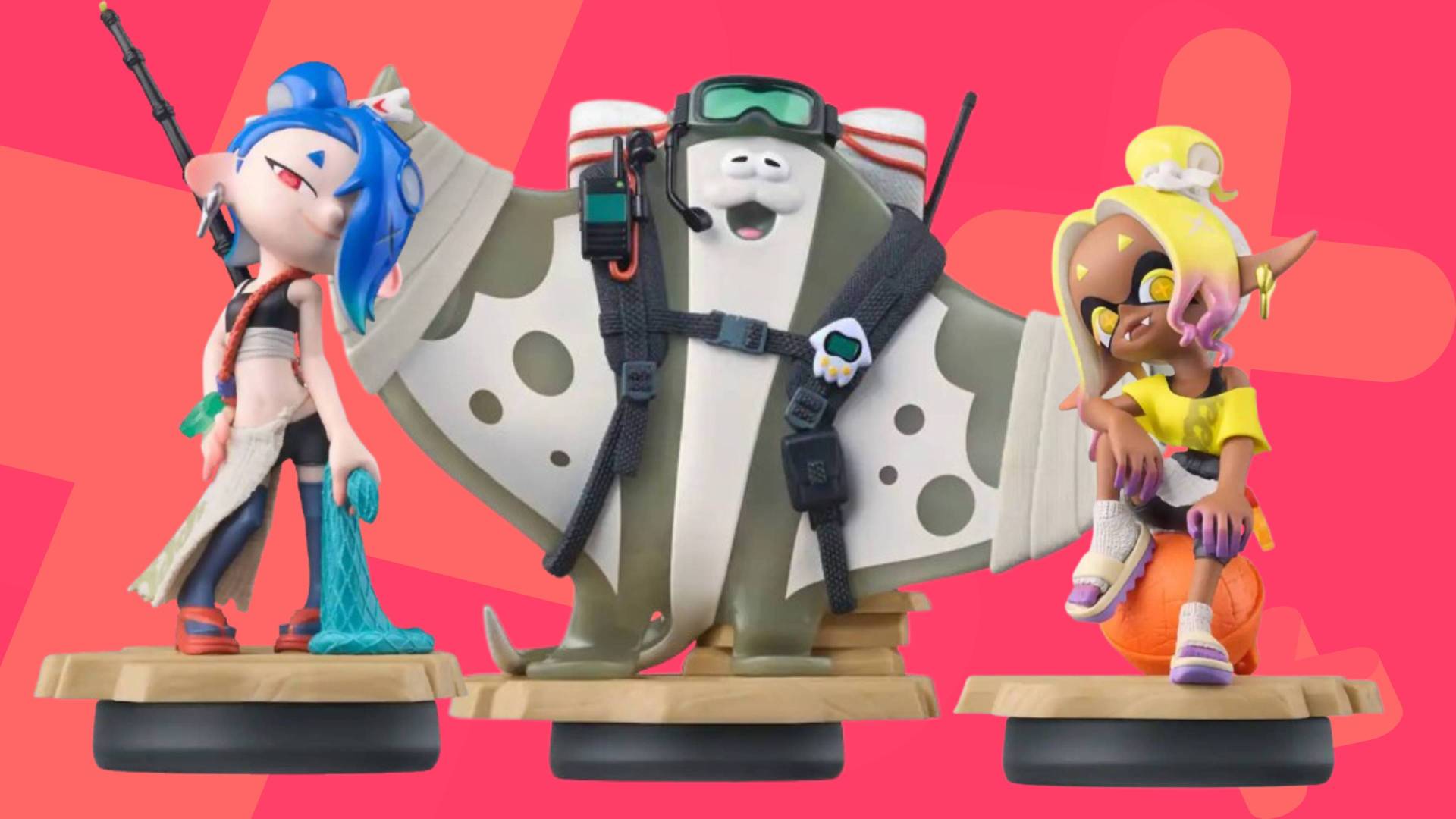 Image of the three Splatoon Raider amiibo on a pink GamesRadar+ background.