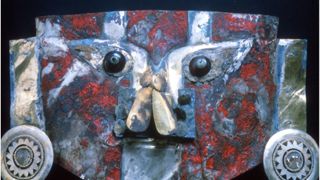 a 1,000-year-old mask was painted, in part, with human blood.