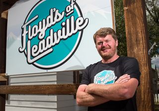 Floyd Landis poses for a portrait in front of his office for Floyd's of Leadville on August 13, 2016