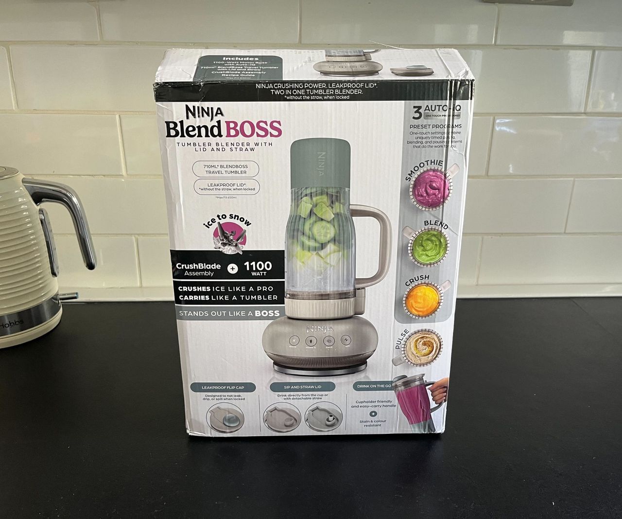 The box for the Ninja Blendboss blender on a black counter, with an illustration of the blender on the front.