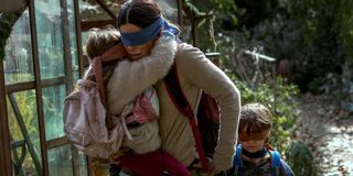 Sandra Bullock, Vivien Lyra Blair, and Julian Edwards in Bird Box