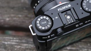 Close up of the film simulation dial on a Fujifilm X-M5 camera