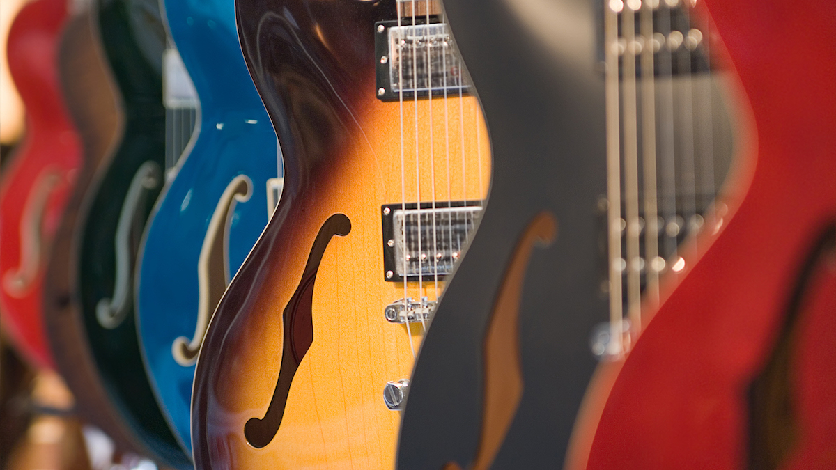 Guitars hanging up in a shop