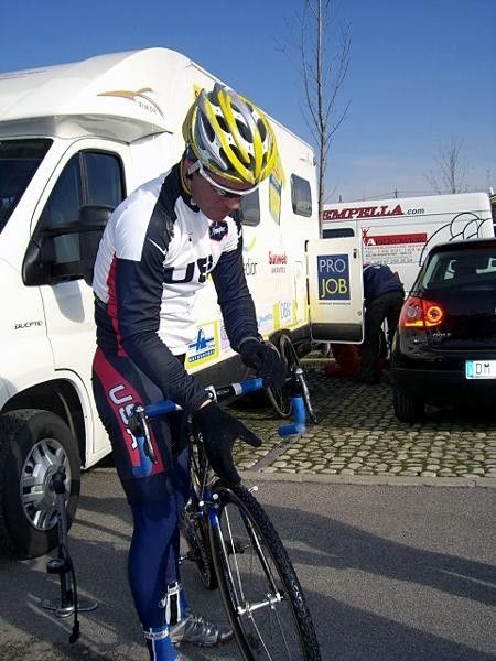 A focused Jonathan Page checks his tire pressure in the USA team box before the race.