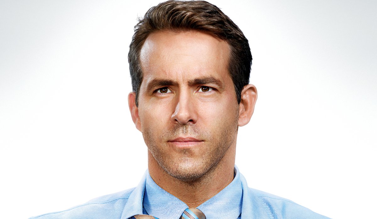 Free Guy Ryan Reynolds staring forward valiantly