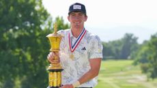 Nick Dunlap with the US Amateur trophy