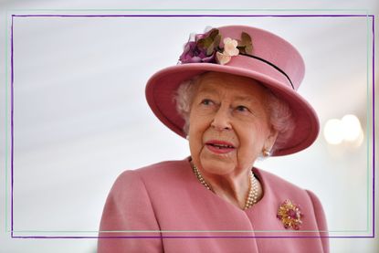 A head and shoulders shot of Queen Elizabeth II wearing a pink coat and hat