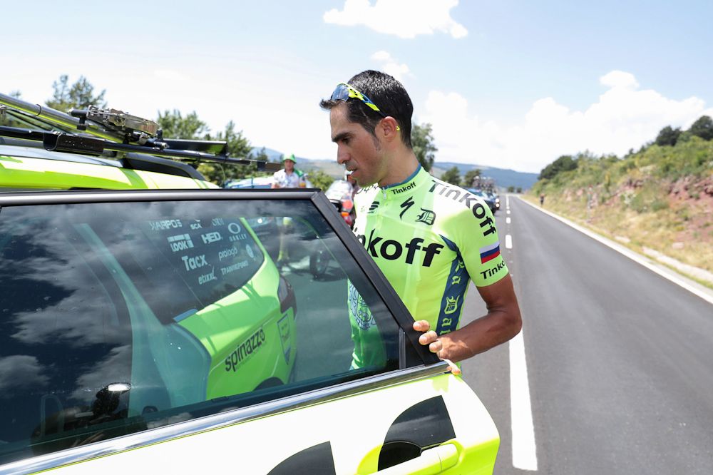 Alberto Contador climbs into the team car during stage 9, abandoning the 2016 Tour de France