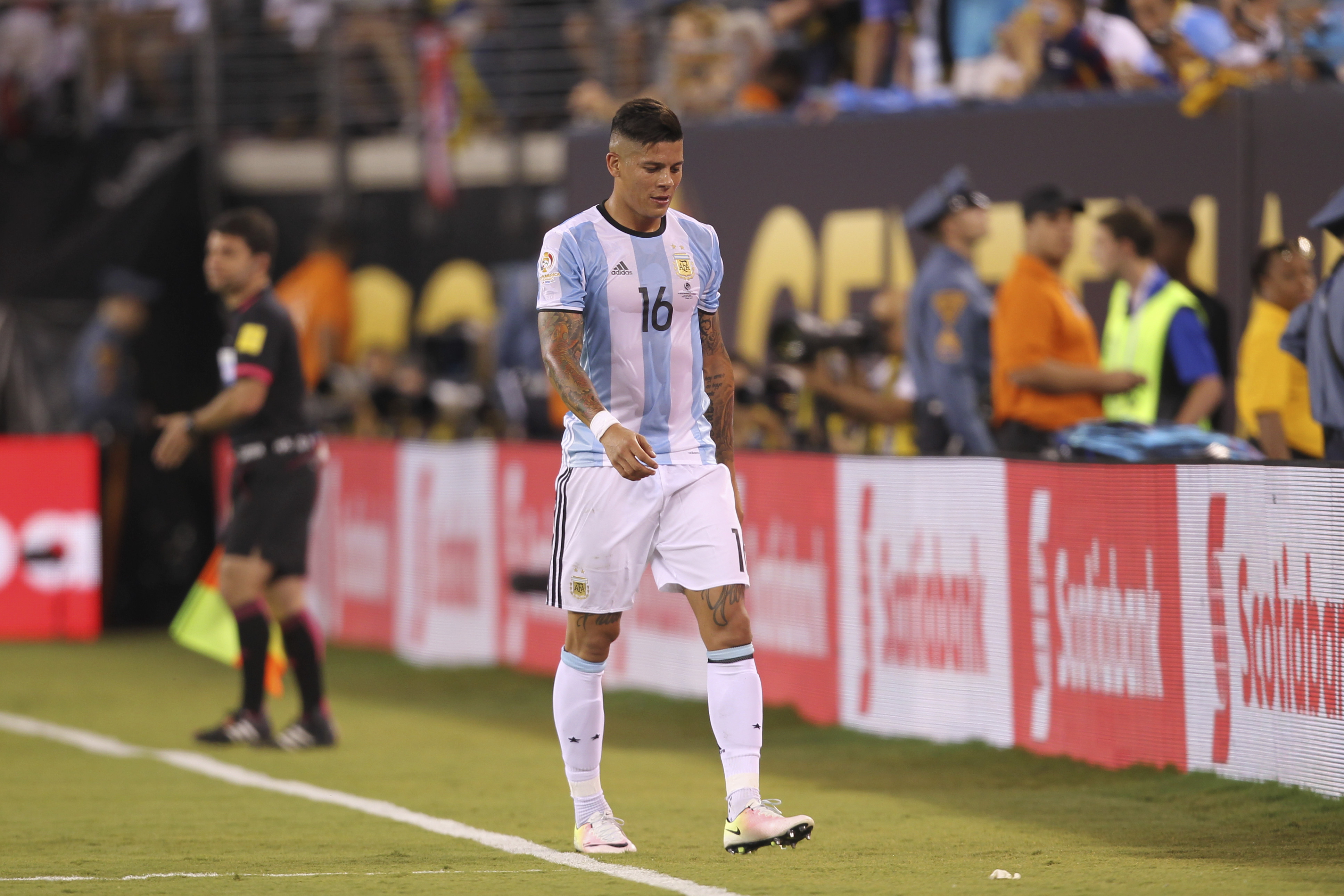 Argentina's Marcos Rojo leaves the field after being shown a red card in the 2016 Copa America Centenario final against Chile.