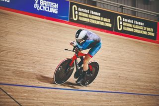 Xavier Disley rides on the track