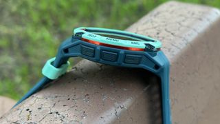 A left-side view of the Garmin Instinct 3's three buttons