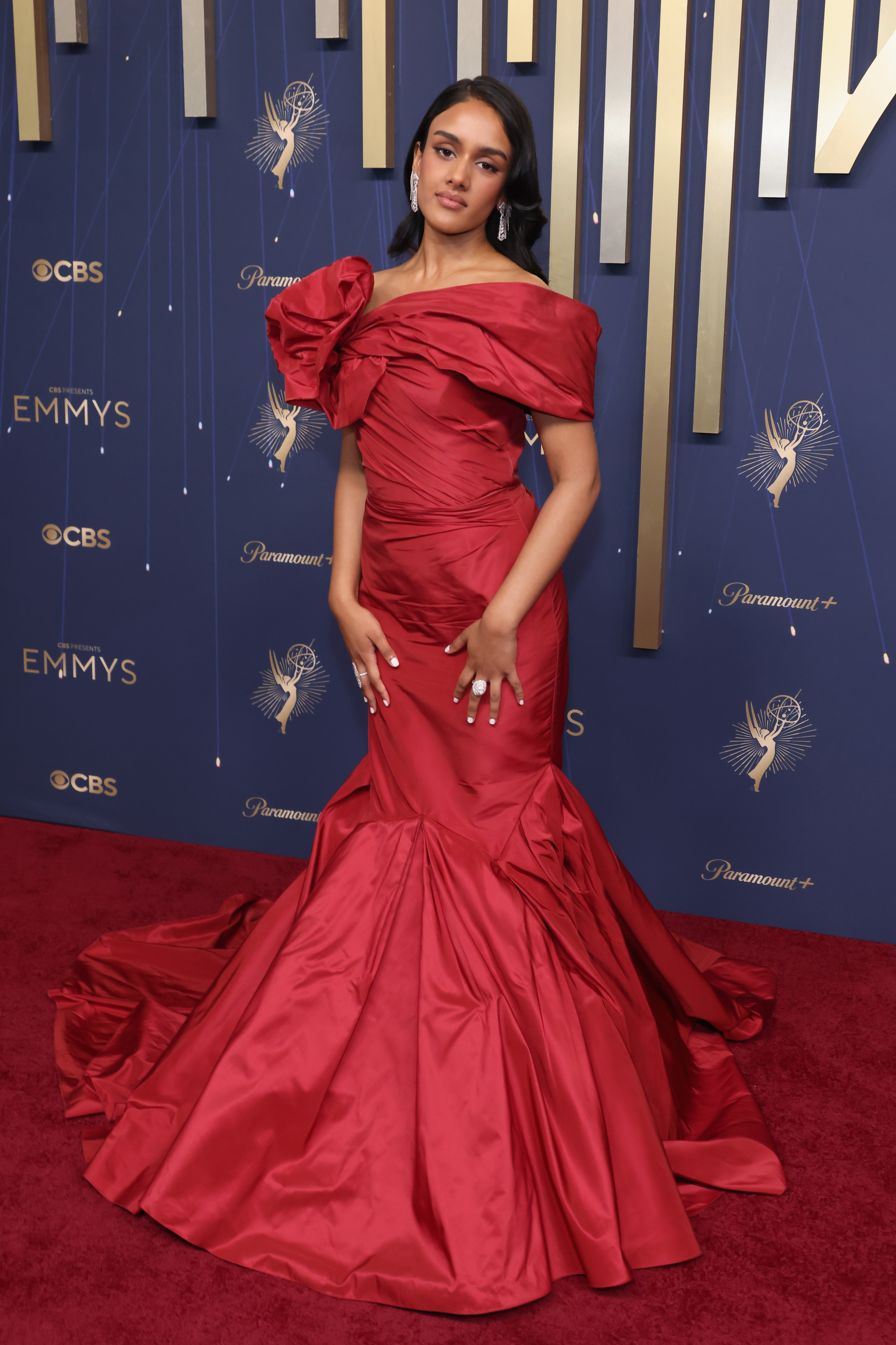 Shabana Azeez in a red gown on the red carpet