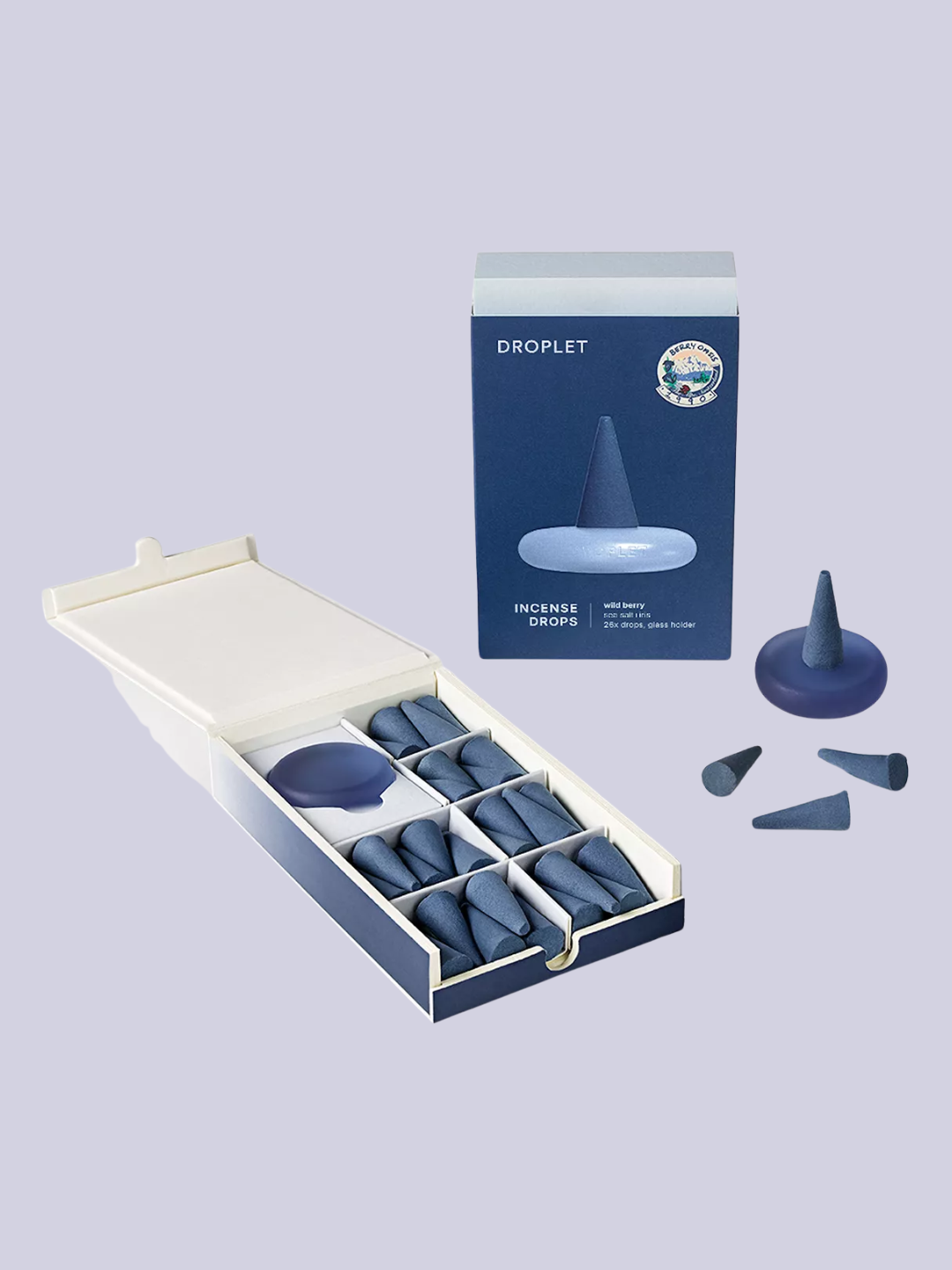 A box of blue wild berry incense cones and a seaglass holder from DROPLET