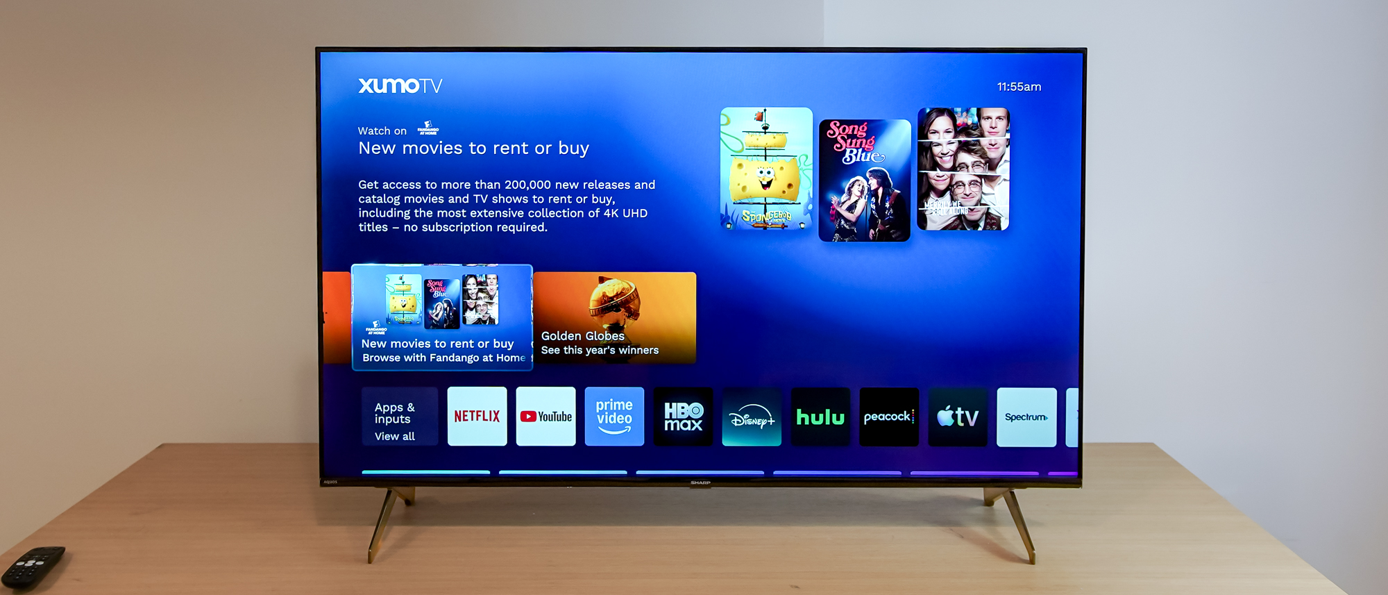 A Sharp Aquos QLED TV on a table