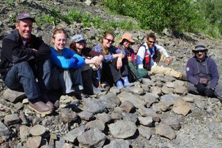 The crew found dozens of dinosaur tracks along one Yukon River beach.