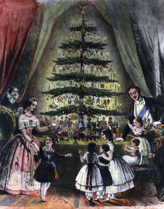 December 1848: The Royal Christmas tree is admired by Queen Victoria, Prince Albert and their children