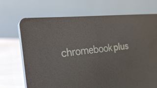 The Chromebook Plus logo on a laptop