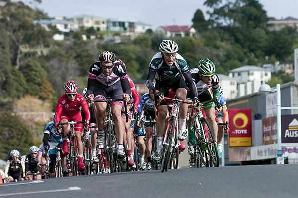 Anthony Giacoppo (right) of Plan B Racing and Jason Allen (Hyster-Total Rush) on the front of the peloton giving chase to two riders up-ahead.