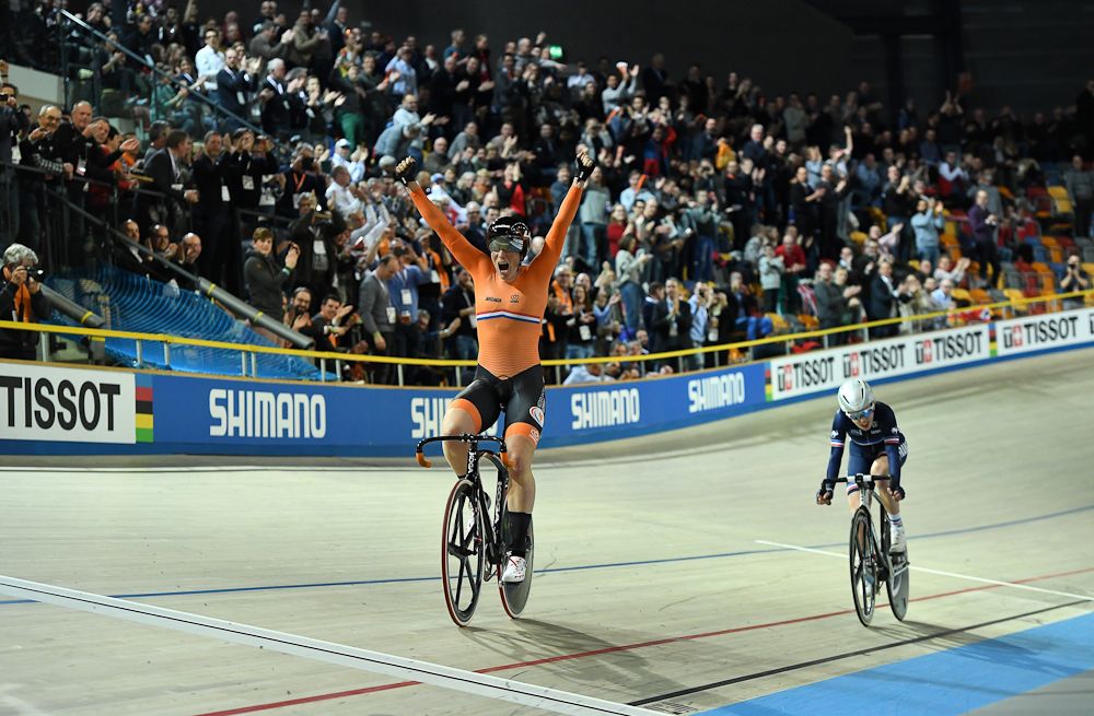Netherland's Kirsten Wild celebrates after her victory in the women's scratch race at The UCI World Cycling Championships in Apeldoorn
