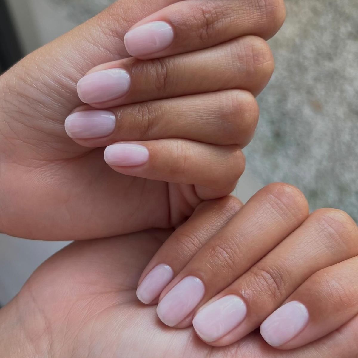 A sheer pink manicure by Georgia Rae