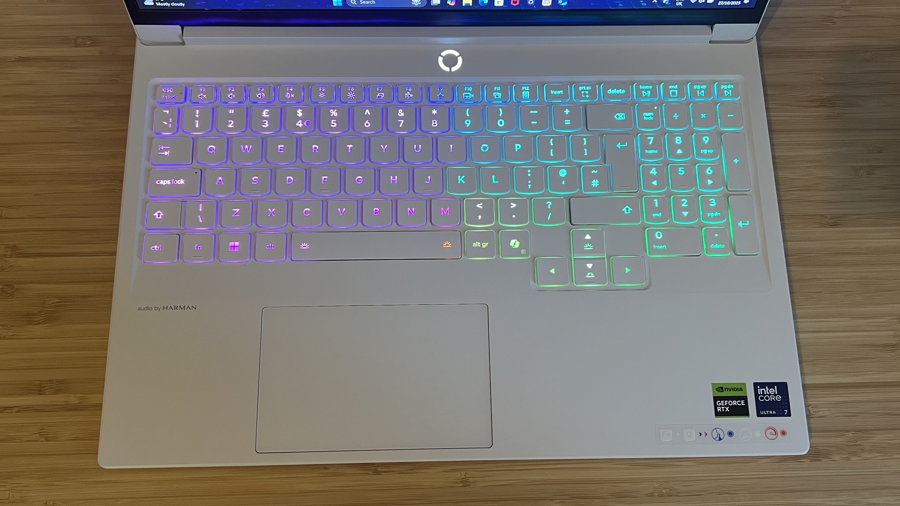 Top down view of Lenovo Legion 7 Gen 10 gaming laptop keyboard with RGB lighting on