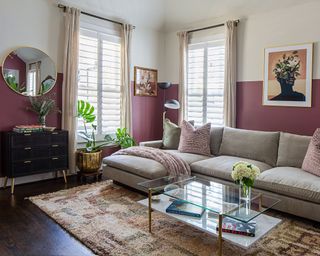 Living room with wine red color on the lower half of the walls and white on the upper half