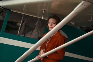 Trudy Cooper, wife of astronaut Gordon Cooper, portrayed by Eloise Mumford, considers her own future in flight, in the fifth episode of National Geographic's "The Right Stuff."
