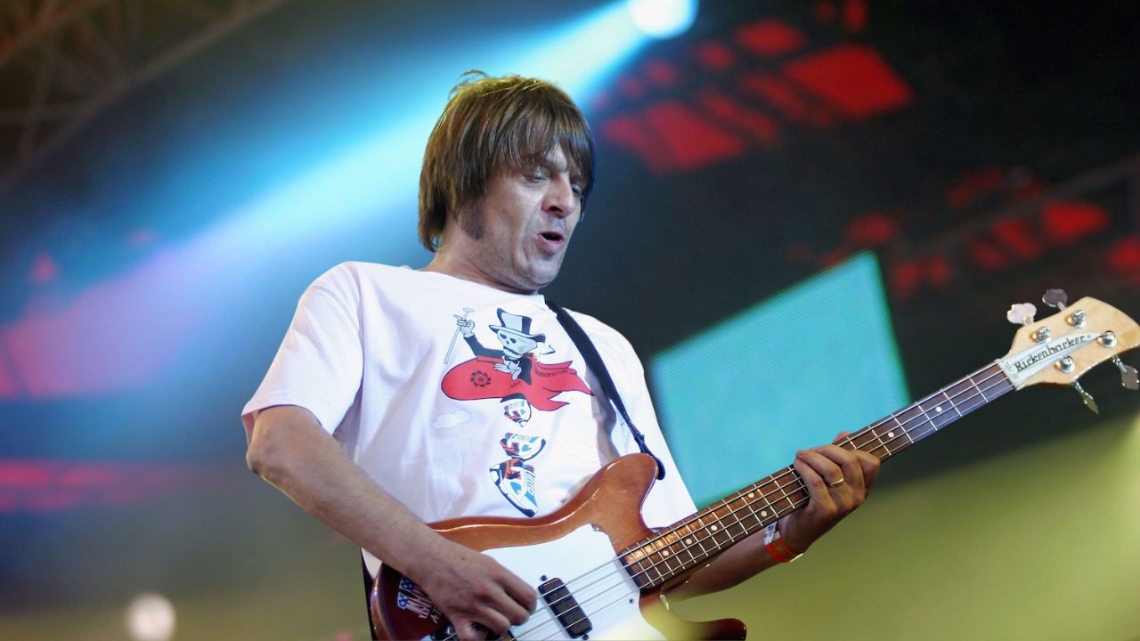 Gary &quot;Mani&quot; Mounfield of Primal Scream performs onstage on the third day of the Roskilde Festival on 1st July in Roskilde, Denmark.