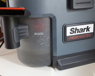 Shark MessMaster wet and dry vacuum water tank filled with water to clean wet messes