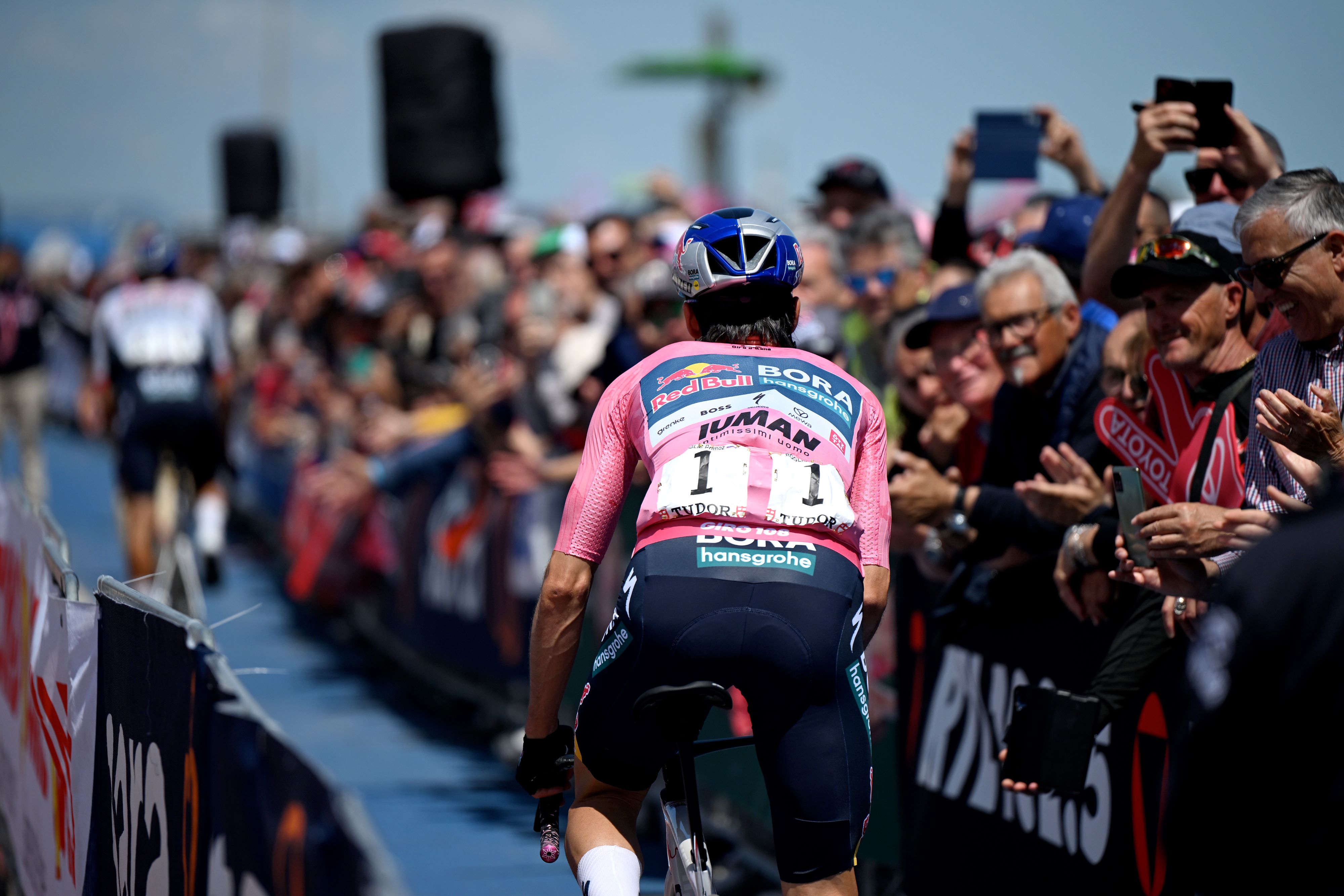 Primož Roglič rolling to sign on for stage 8 of the Giro d'Italia 2025