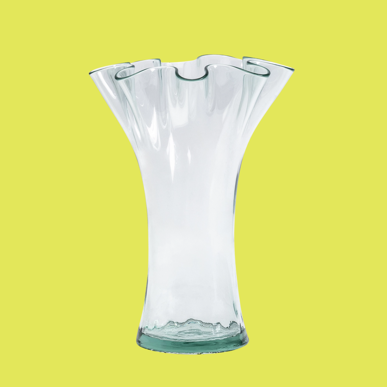 A glass vase with a rippled rim