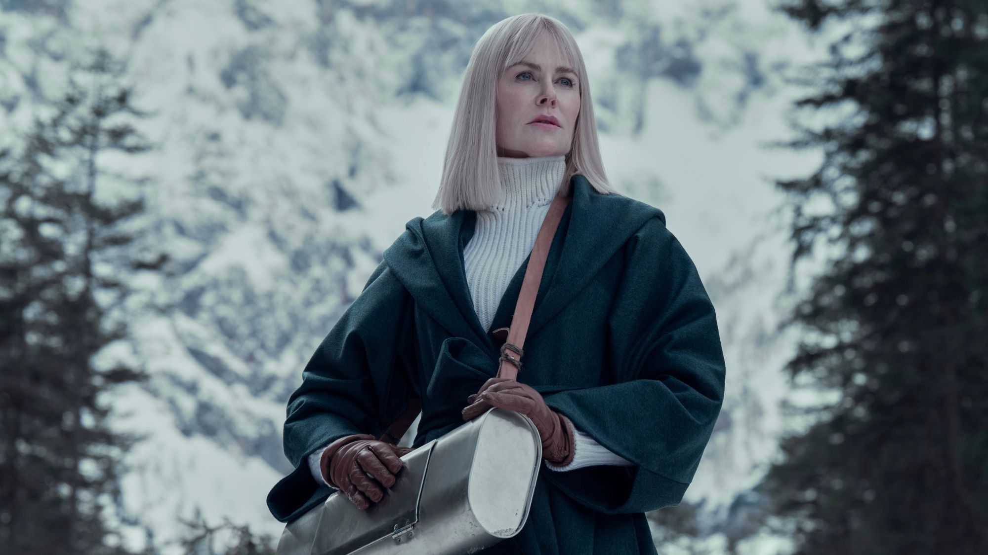 Nicole Kidman in Nine Perfect Strangers in the alps, looking into the distance