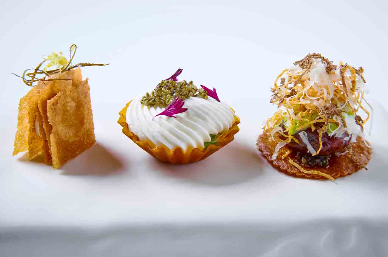 ARTE restaurant's Amuse Bouche - sheep-cheese chips paired with grape gel and marinated leaves &amp;amp; smoked eel with creamed horseradish, tonburi and chives