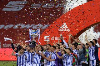 Real Sociedad players celebrate their Copa del Rey final win over Basque rivals Athletic Club in April 2021.