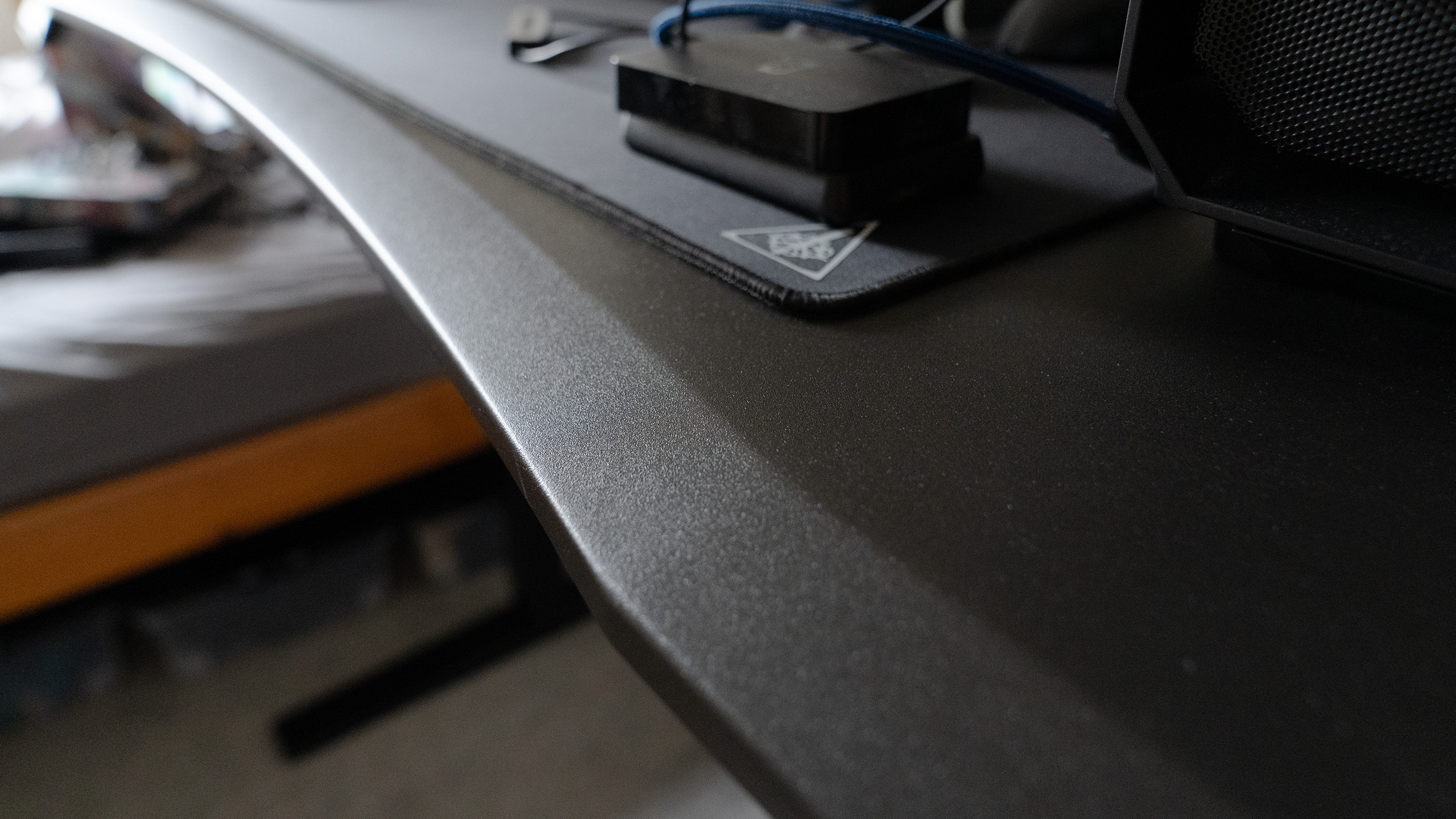 A close up of the surface of the FlexiSpot G7 gaming desk