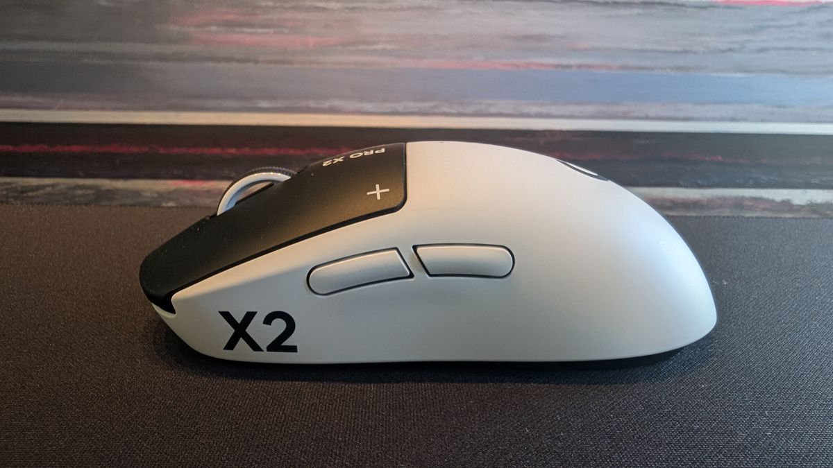 The Logitech G Pro X2 Superstrike pictured on a black mouse mat.