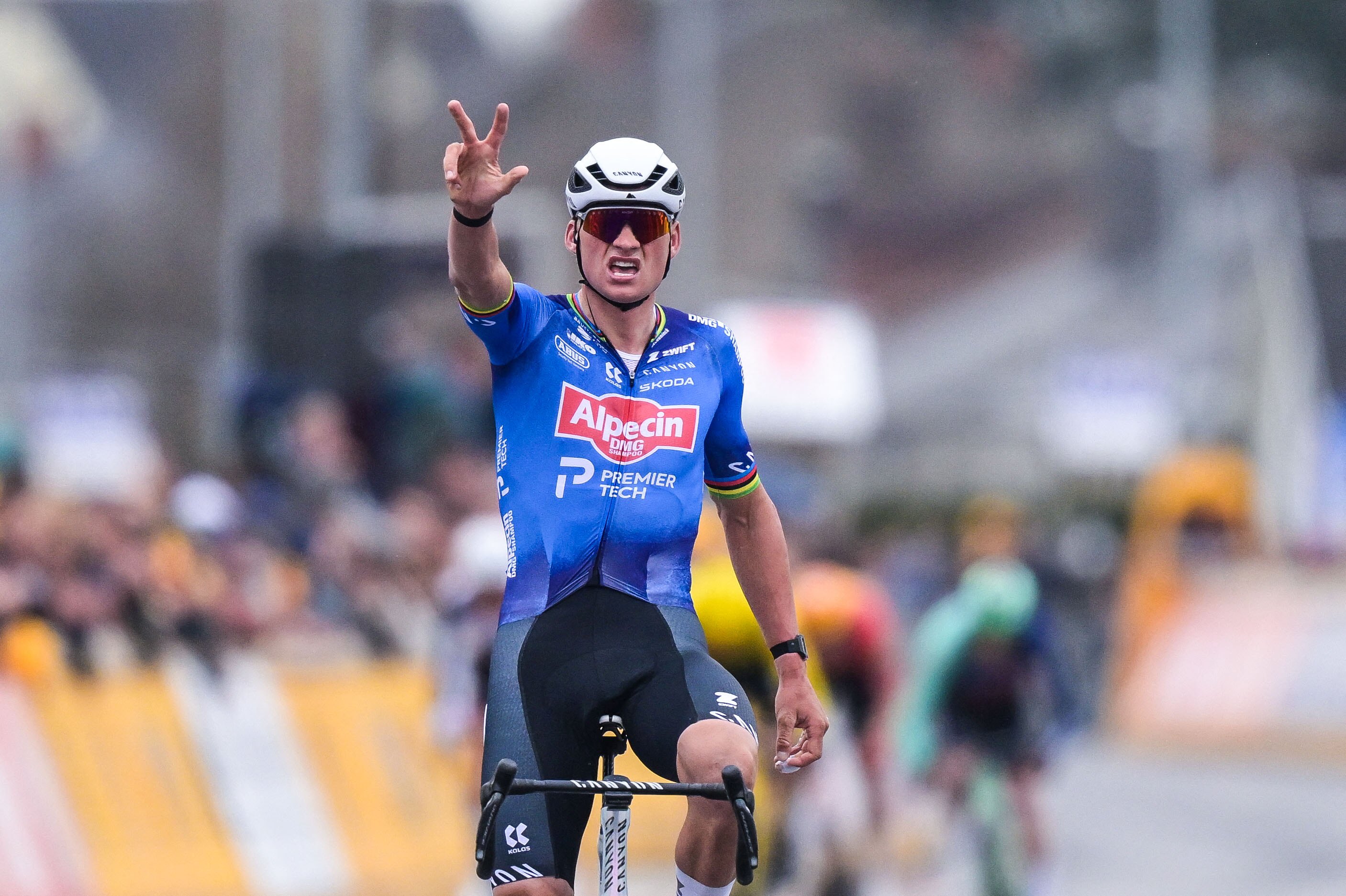 Alpecin-Premier Tech's Dutch rider Mathieu van der Poel celebrates as he crosses the finish line to win the 'E3 Classic', one day cycling race, 208.8 km from and to Harelbeke, on March 27, 2026. (Photo by DAVID PINTENS / Belga / AFP) / Belgium OUT