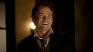 Hugh Jackman smiling in The Greatest Showman.