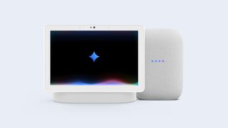 A smart display and smart speaker with the Google gemini glyph in the center of the display