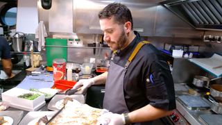 Chef Marcos cooking on Below Deck Sailing Yacht