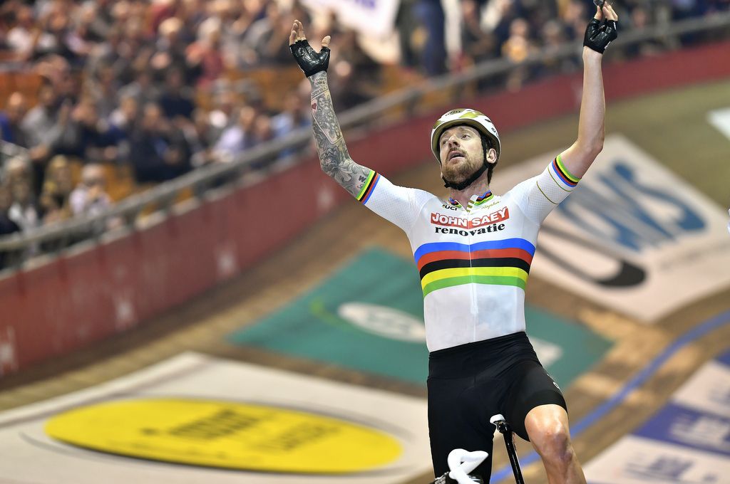 Bradley Wiggins throws his arms up after the Derny