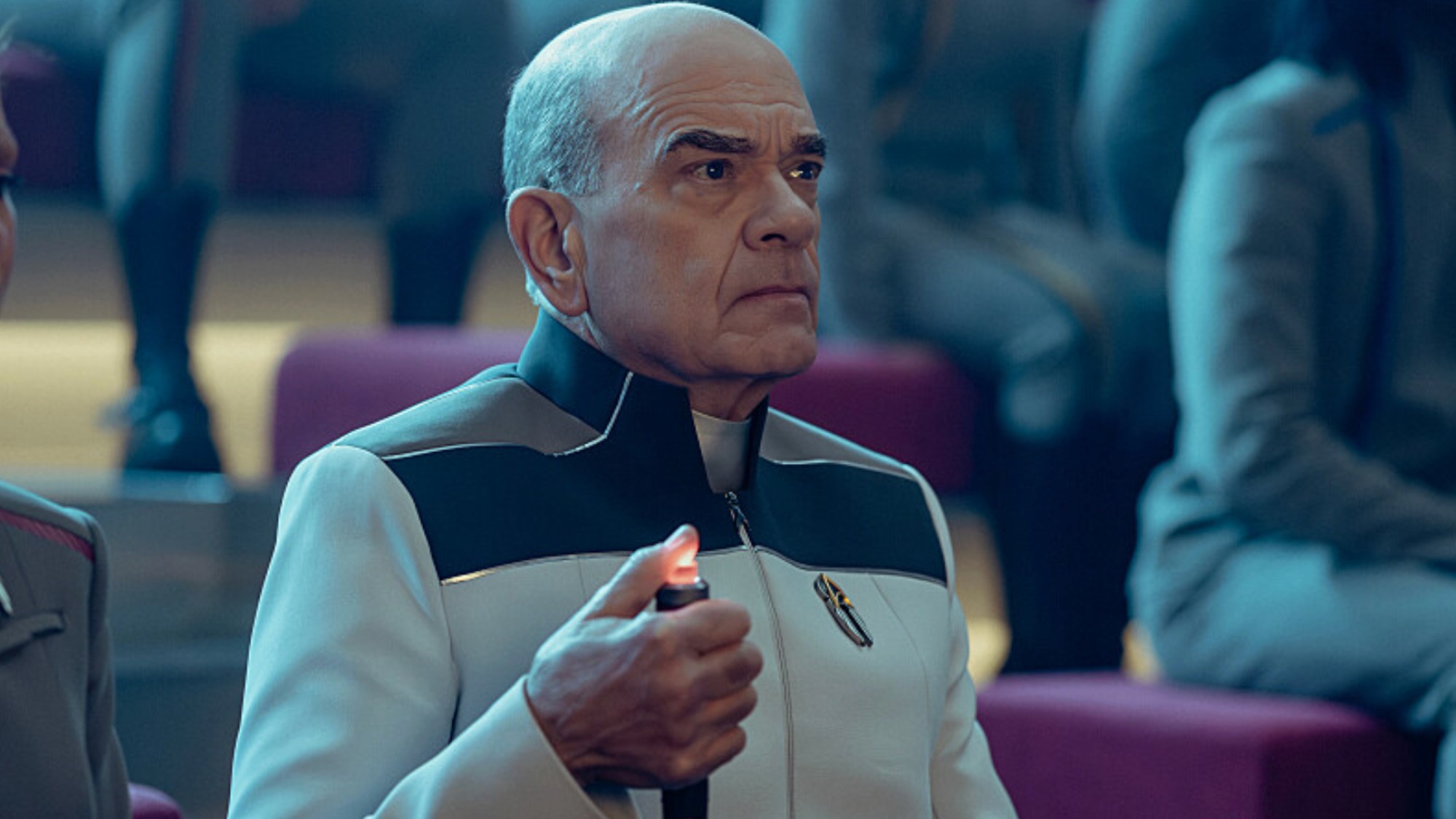 The Doctor keeps score during a heated debate.