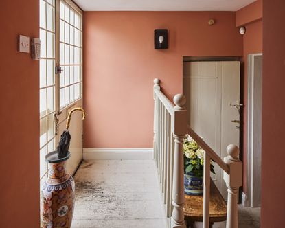 Hallway with peach colored walls