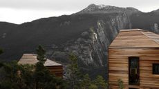 view of Bolder lodges in fjord in norway by snøhetta